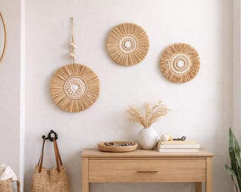 May include: A set of three ceramic nesting bowls in shades of blue, green, and white. The bowls feature a speckled glaze and a simple, modern design. The largest bowl measures approximately 6 inches in diameter.