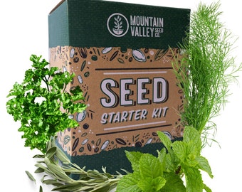 May include: A seed starter kit box with the text "SEED STARTER KIT" and the logo of "Mountain Valley Seed Co." is surrounded by fresh herbs, including parsley, sage, mint, and dill. The box is green and brown.