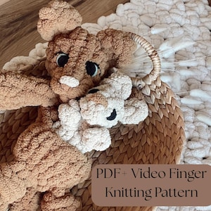 May include: A white ceramic mug with a black handle and the text "But First, Coffee" in a black, bold font. The mug is on a white surface.