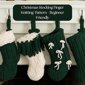 May include: Four handmade Christmas stockings in dark green and white, hanging from a mantelpiece. Two stockings have white cuffs, one has white bows, and the text on the sign says "Christmas Stocking Finger Knitting Pattern - Beginner Friendly."