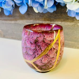 Kintsugi Teacup in Pink Reactive Glaze, Stoneware with Gold-Toned Repaired Seams