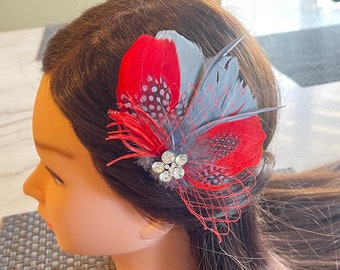 Red Feather Fascinator Hair Clip. Handmade in USA.
Ostrich feather accent. Rhinestone Feather Fascinator - Red and Black Feather Hair  main image 2