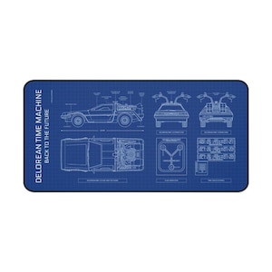 May include: A blue mousepad featuring a blueprint design of the DeLorean time machine from Back to the Future. The design includes side, front, and top views of the car, along with the flux capacitor and time circuits panel.