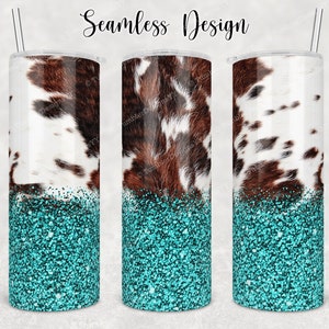May include: Three stainless steel tumblers with a cowhide pattern and turquoise glitter base. The tumblers have a white and brown cowhide design on the upper half and a turquoise glitter design on the bottom half. The text "Seamless Design" is at the top.