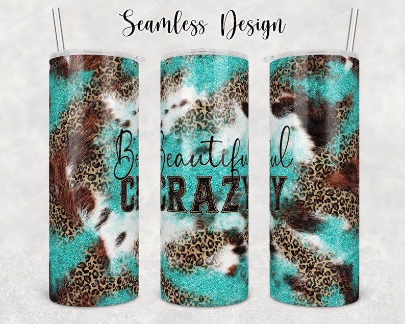 Peut inclure: Un gobelet turquoise et marron avec un motif en peau de vache et l&eacute;opard. Le gobelet porte l'inscription "Be Beautiful Crazy".