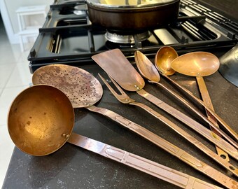 Vintage copper hanging utensils