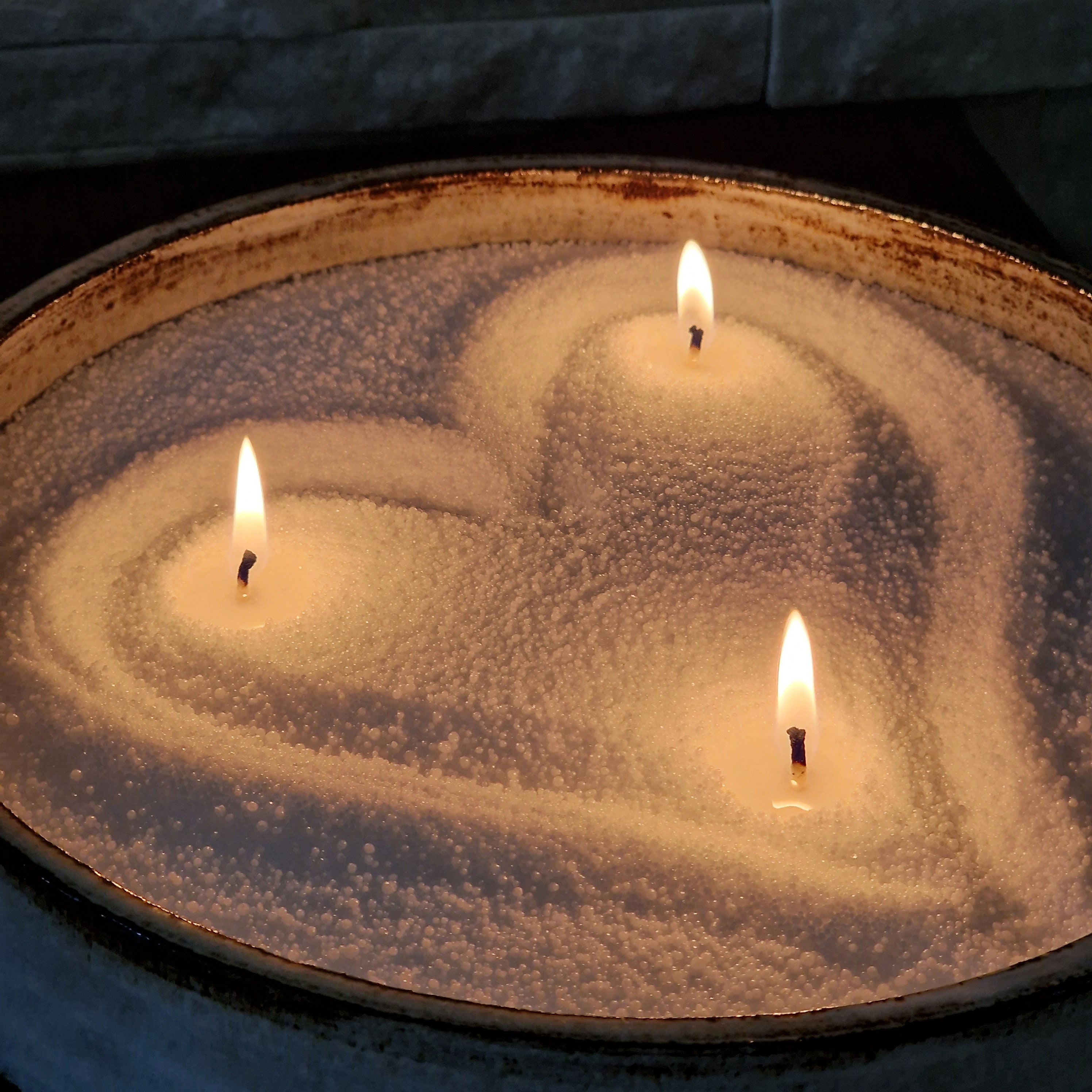 Blue and white granulated wax crystals to create candles by pouring in bowl  and inserting wick. Handmade sand candle in white ceramic bowl on white  Stock Photo - Alamy