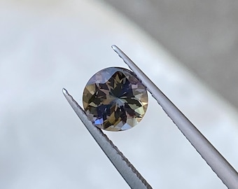 Natural Tanzanite Gemstone | 1.25 Carat Round Cut, Blue-Violet