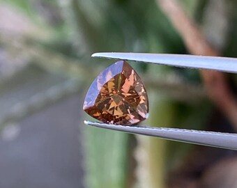 Natural Tanzanite zoisites trillion cut weight 1.35 CT size 7.10 mm color brown