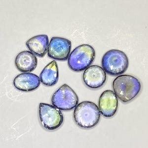 Bi-Color Tanzanite Gemstones: Faceted Violet Green Collector's Stones (15.20 CT, 13 Pieces)