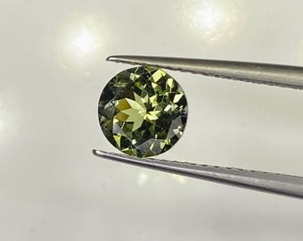 Green zoisite tanzanite Round cut stone weight 1.05 Ct Size 6.50 MM