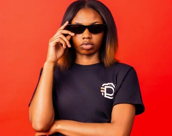 Delk Develops logo (front) Don't Ever Limit Kids (back) Unisex Tee T-shirt