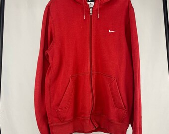 red zip up sweater