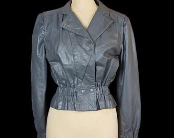 Veste courte en cuir grise des années 80 sans marque