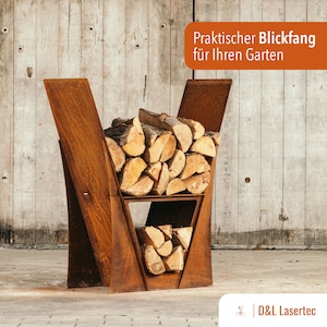 May include: A rusty metal firewood rack with two shelves. The rack is shaped like a V and is filled with stacked firewood. The text "Praktischer Blickfang für Ihren Garten" is visible in the top right corner of the image.