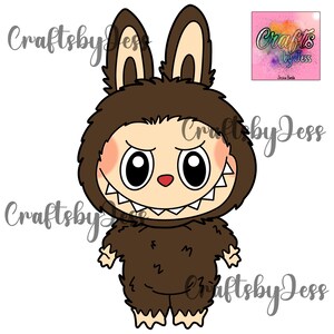 May include: A brown cartoon monster wearing a furry brown costume with large ears. The monster has a toothy grin and large black eyes.