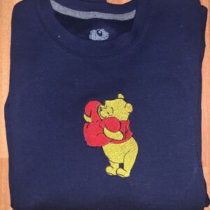 Winnie the Pooh Hugging Heart