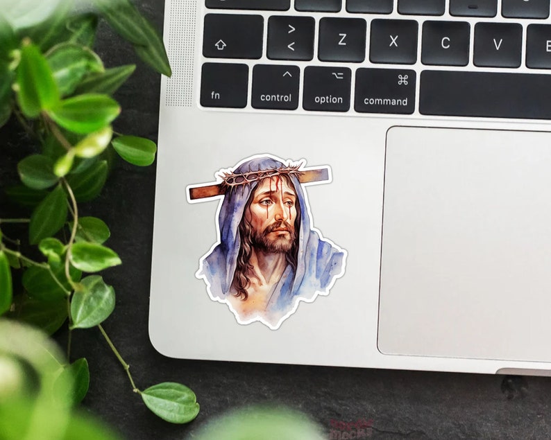 May include: A watercolor painting of a man with a crown of thorns on his head. He is wearing a blue robe and has a sad expression on his face.
