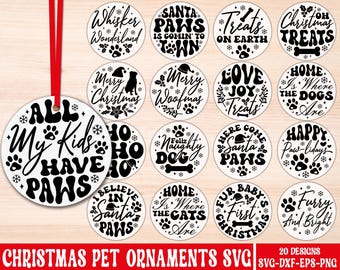 May include: A collection of 20 Christmas pet ornament designs in a variety of styles. The ornaments are round and feature phrases like "All My Kids Have Paws," "Santa Paws," and "Merry Christmas Woofmas." Each design includes paw prints and snowflakes.