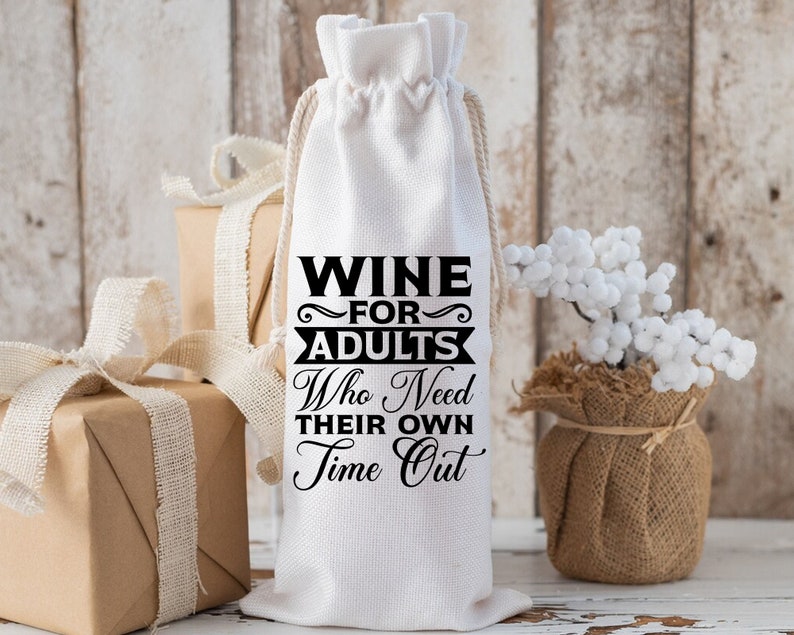 May include: White wine bottle bag with black text that reads "Wine for Adults Who Need Their Own Time Out".