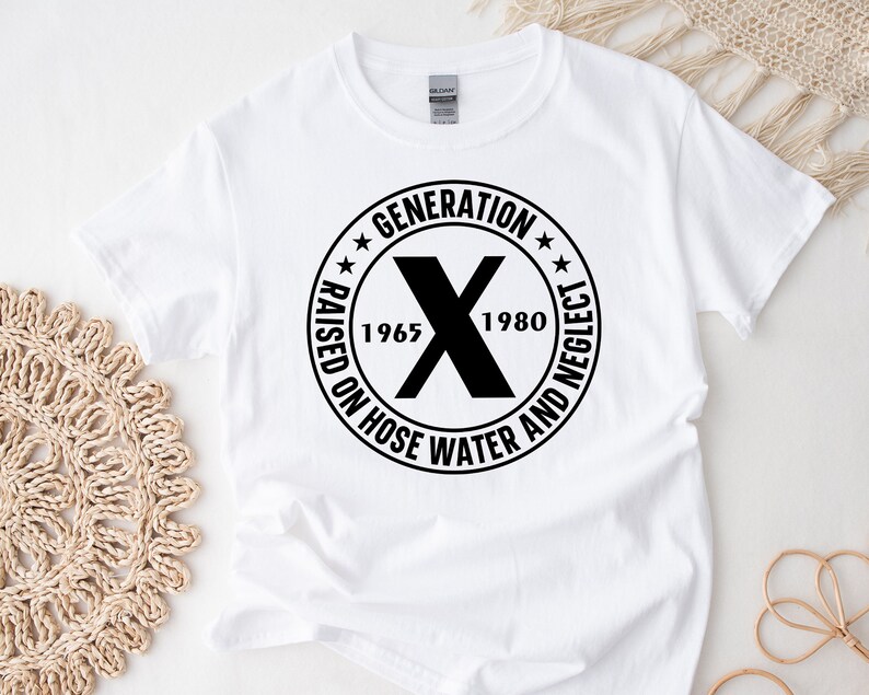 May include: White t-shirt with a black circle graphic that says "Generation X Raised on Hose Water and Neglect 1965-1980".