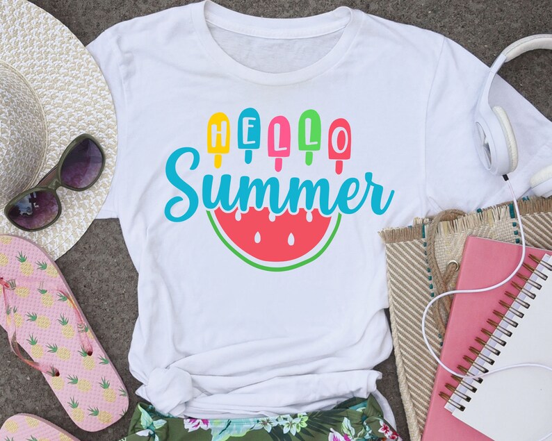 May include: White t-shirt with a watermelon graphic and the text "HELLO Summer" with colourful popsicle graphics.