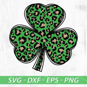 May include: A green shamrock with a leopard print pattern. The shamrock is outlined in black.