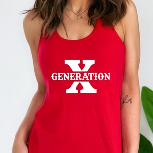 May include: Red tank top with a white graphic that says "GENERATION X" with a large white "X" that has a spade symbol inside of it.