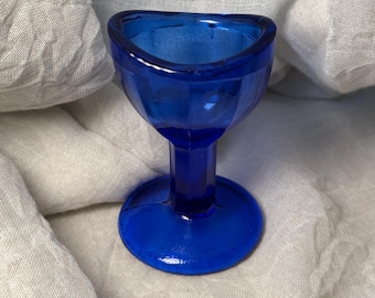 Vaso lavaojos de vidrio azul cobalto vintage de los años 40: lavaojos médico antiguo con diseño octogonal