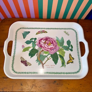 May include: White rectangular serving tray with handles, featuring a large pink peony and various butterflies and a dragonfly. The tray has a green border with a botanical design and the text "PEONIA MOUTAN Shrubby Peony".