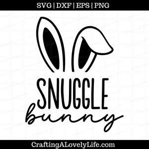 Puede incluir: Dise&ntilde;o gr&aacute;fico en blanco y negro de orejas de conejo con el texto "Snuggle Bunny" debajo. El dise&ntilde;o es para proyectos de manualidades como calcoman&iacute;as de vinilo, transferencias de planchado, etc.