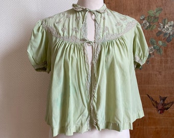 1930s hand dyed green silk and lace bed jacket