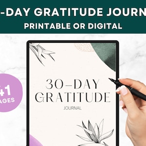 May include: A digital journal cover with a pink and green watercolor background. The text "30-DAY GRATITUDE JOURNAL" is written in black. A hand is holding a stylus over the journal.