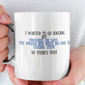 May include: White ceramic mug with a blue text design that reads "I wanted to go jogging but Proverbs 281 says the wicked run when no one is chasing them so there's that."