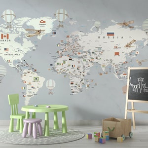 Carta da parati murale educativa per la camera dei bambini Mappa del mondo con bandiere nazionali, palloncini e aerei