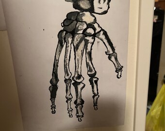 May include: A black and white hand skeleton painting on a white background.