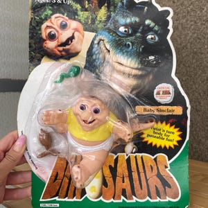 Vintage Baby Sinclair figure toy 1991 new old stock on card, Sinclair dinosaur pvc official figurine TV series Dinosaurs