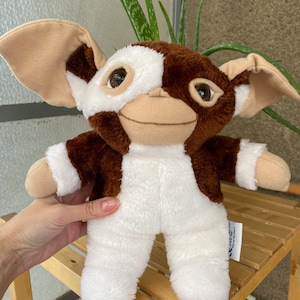 Peluche vintage Gizmo Gremlins 1999 Michael Mühleck, morbido animale domestico mostro marrone e bianco da collezione di medie dimensioni