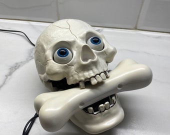 Cool white working Skull Phone 1990s, vintage unusual weird Novelty Telephone skull head with moving eyes