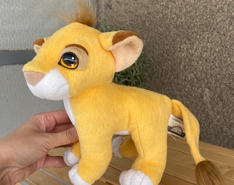 2003年Hosung社製の茶色とオレンジ色の話す猿のぬいぐるみ