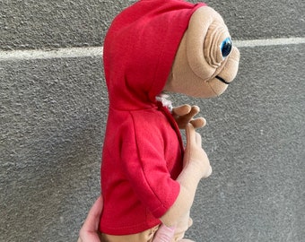 Peluche E.T. De 25 Cm – El Extraterrestre Con Capucha Roja, Juguete Suave Y Coleccionable
