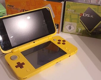 Nintendo 2ds xl 2024 pikachu edition console