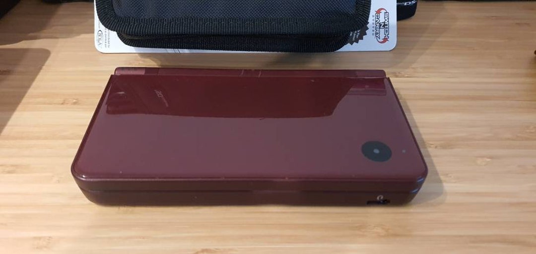 Restored Nintendo DSi XL (Burgundy) Handheld Video Game Console with Stylus  and Charger (Refurbished) 