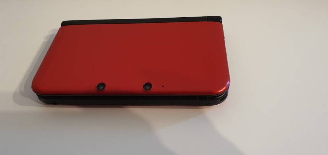 Nintendo 3ds xl red and sale black