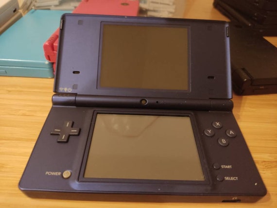Nintendo DSi XL with 14 Games with Charger and Storage Bag