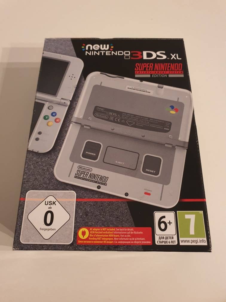 Verzegelde nieuwe Nintendo 3ds XL snes edition.5k games. 128gb..met  oplader. Geen verzendkosten. Volledig geladen Regiovrij apparaat.getest.