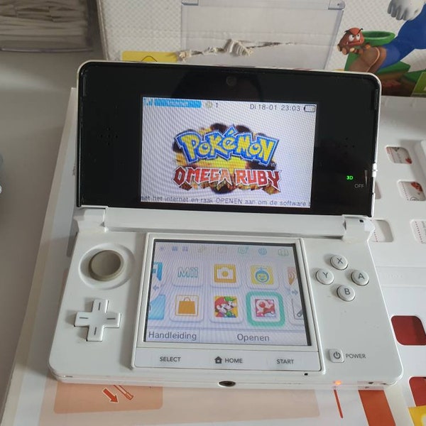 Og Nintendo 3ds ice white edition. With 250+ games. Original. Super condition. Vintage game console with chargedock. Region free. Free case