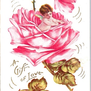 Fee Engelsgesicht in Blüte rosa geprägt c1910 Original Postkarte TK1-27