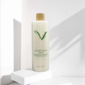 May include: A white bottle of conditioner with a wooden cap. The bottle has a green 'V' logo and the words "Conditioner" and "DeepQuench" printed on it. The bottle is 500ml.