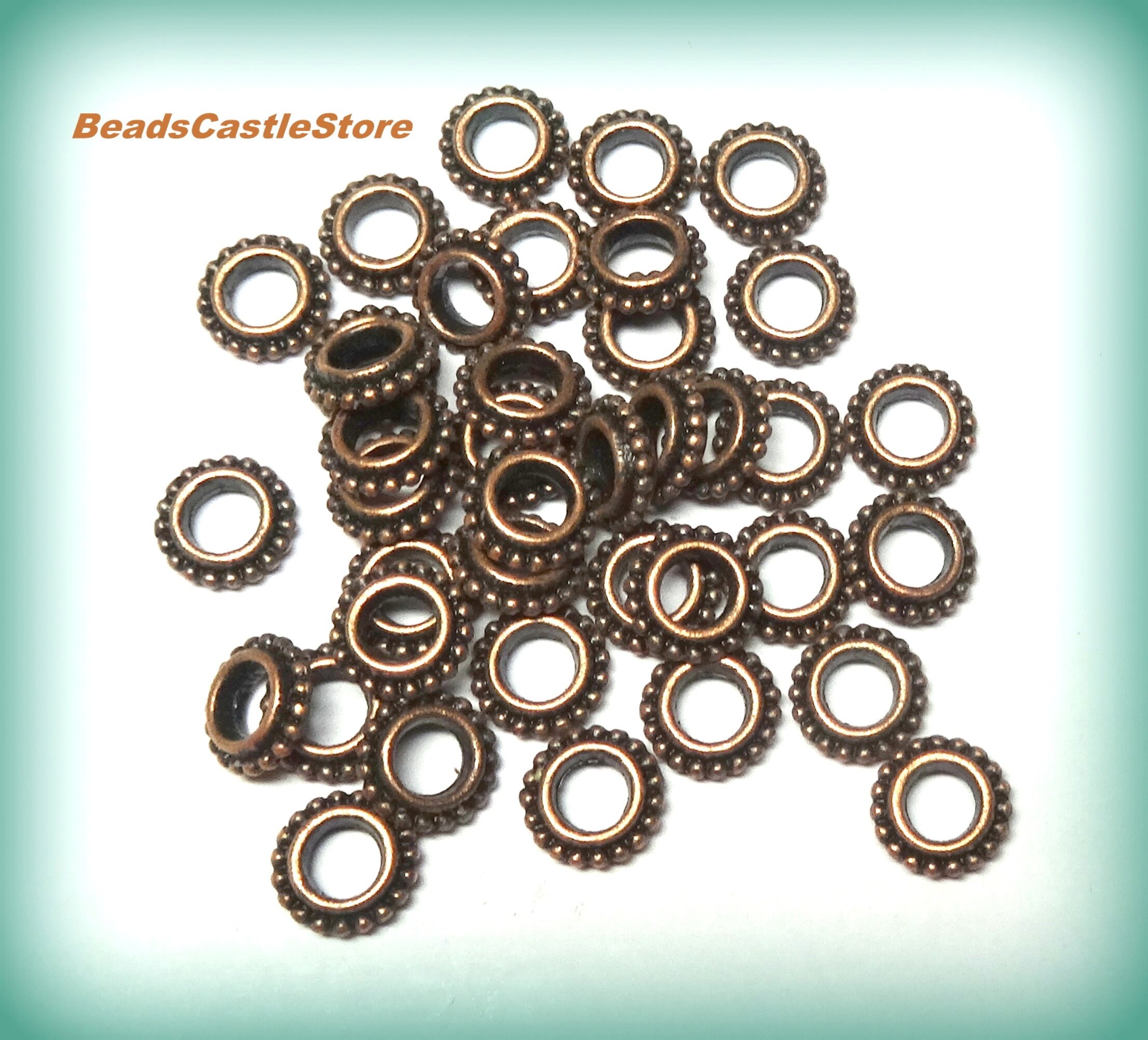 Antique Copper Colored Spacer Beads 8mm Quantity 100. Antique Copper Colored Spacer Beads 8mm Quantity 100.